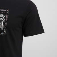 Close-up of sleeve on Tanzania Zebra Herd Graphic T-Shirt in black